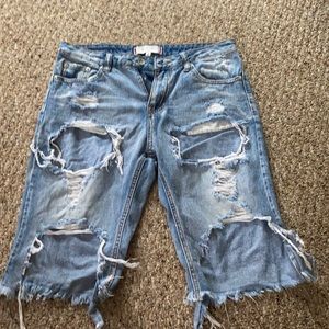 Ripped long jean shorts